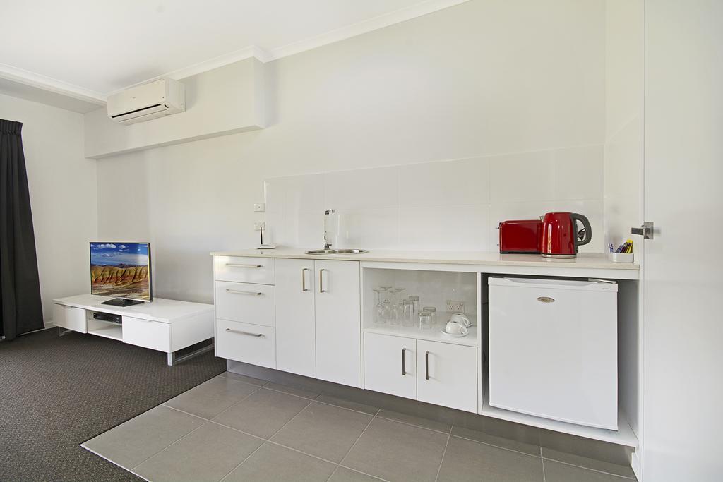 Cooroy Luxury Motel Apartments Quarto foto